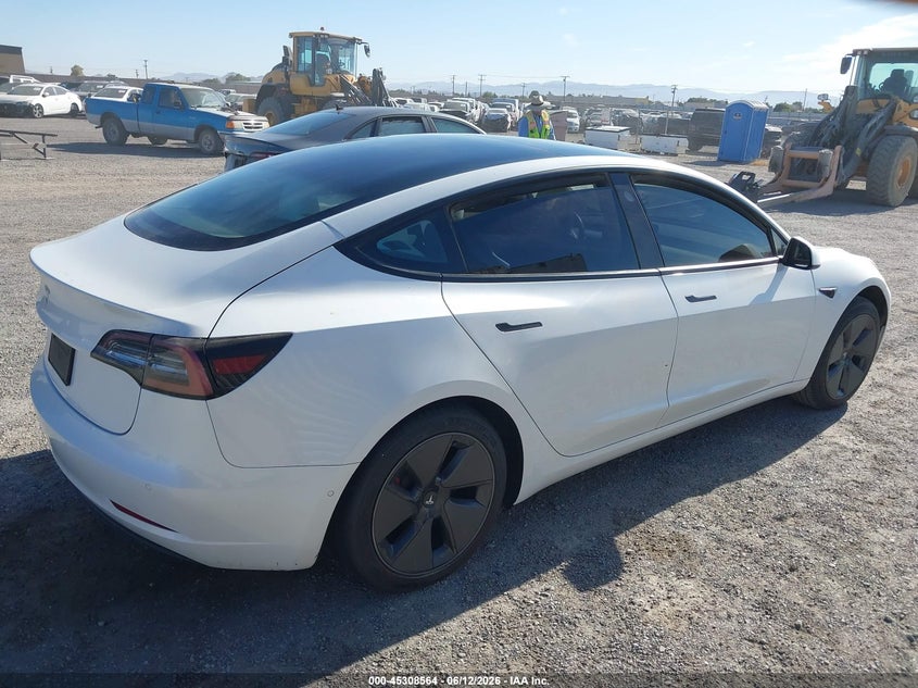 2021 Tesla Model 3 VIN 5YJ3E1EA8MF873198 IAAI salvage auction — SIDE, Salvage Title, sold $3,225 on 2026-07-16 (photo 4)