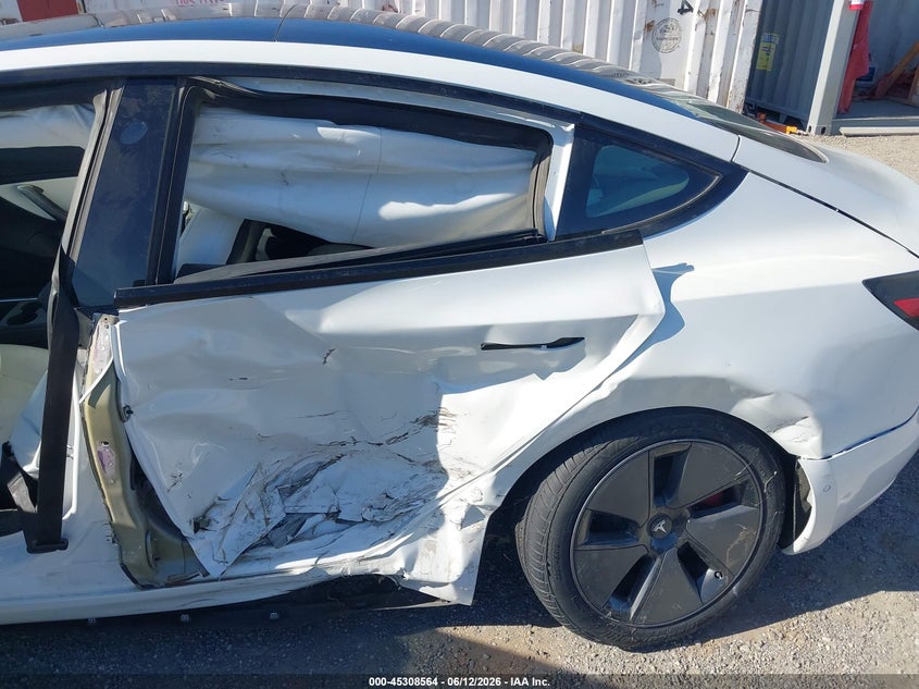 2021 Tesla Model 3 VIN 5YJ3E1EA8MF873198 IAAI salvage auction — SIDE, Salvage Title, sold $3,225 on 2026-07-16 (photo 6)