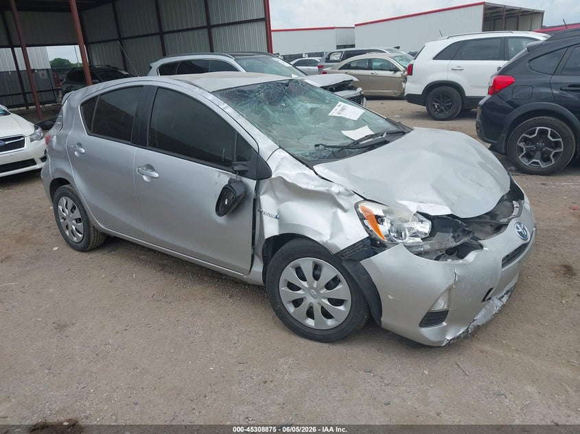2013 Toyota Prius c VIN JTDKDTB31D1548577 IAAI salvage auction — ROLLOVER, Salvage Title, sold $250 on 2026-07-14 (photo 1)