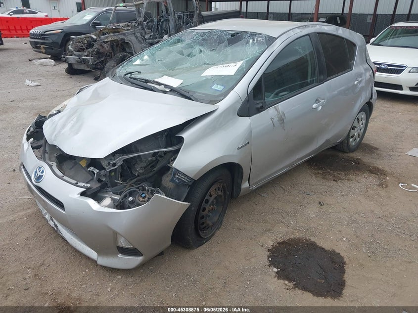 2013 Toyota Prius c VIN JTDKDTB31D1548577 IAAI salvage auction — ROLLOVER, Salvage Title, sold $250 on 2026-07-14 (photo 2)