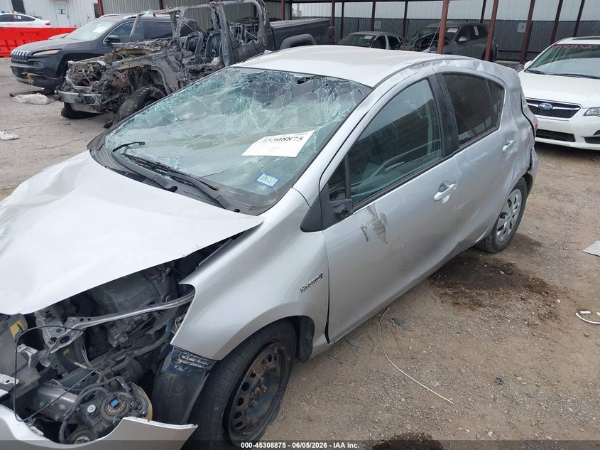 2013 Toyota Prius c VIN JTDKDTB31D1548577 IAAI salvage auction — ROLLOVER, Salvage Title, sold $250 on 2026-07-14 (photo 6)