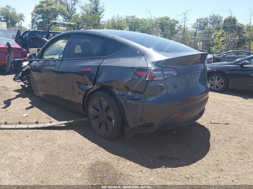 2024 Tesla Model y VIN 7SAYGDED5RF186542 IAAI salvage auction — SIDE, Salvage (Idaho), sold $7,300 on 2026-07-29 (photo 3)
