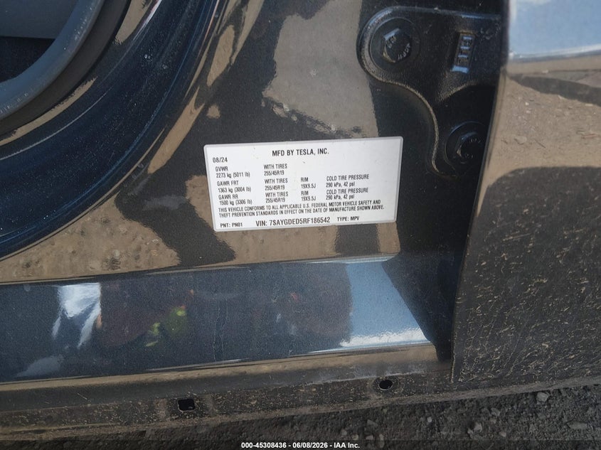 2024 Tesla Model y VIN 7SAYGDED5RF186542 IAAI salvage auction — SIDE, Salvage (Idaho), sold $7,300 on 2026-07-29 (photo 9)