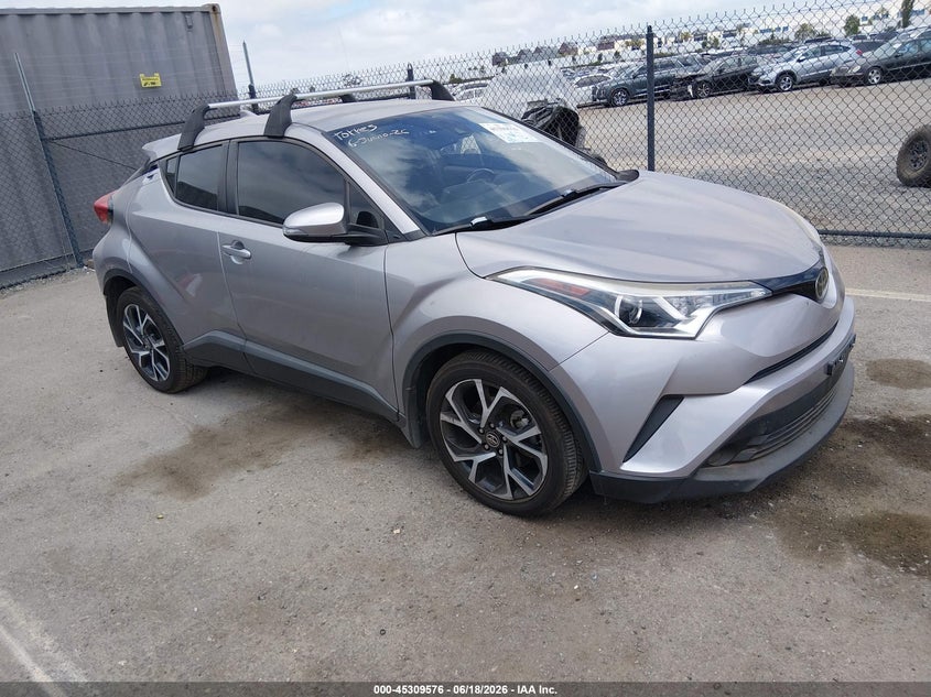 2018 Toyota C-hr VIN NMTKHMBXXJR023866 IAAI salvage auction — SIDE, Salvage Title, sold $5,300 on 2026-07-11 (photo 1)