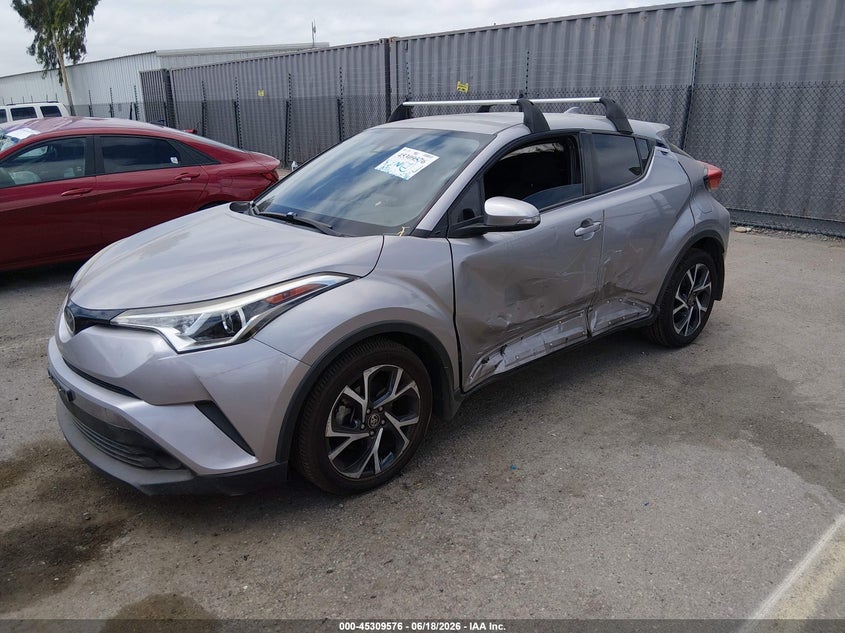 2018 Toyota C-hr VIN NMTKHMBXXJR023866 IAAI salvage auction — SIDE, Salvage Title, sold $5,300 on 2026-07-11 (photo 2)