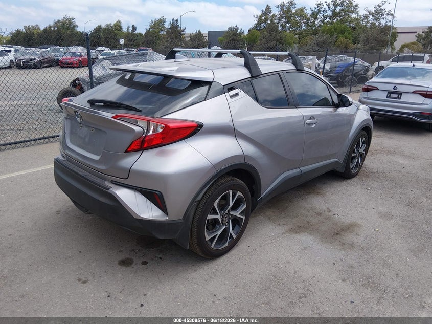 2018 Toyota C-hr VIN NMTKHMBXXJR023866 IAAI salvage auction — SIDE, Salvage Title, sold $5,300 on 2026-07-11 (photo 4)
