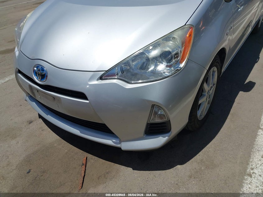 2014 Toyota Prius c VIN JTDKDTB3XE1066224 IAAI salvage auction — NORMAL WEAR, Salvage Title, sold $4,675 on 2026-07-07 (photo 6)