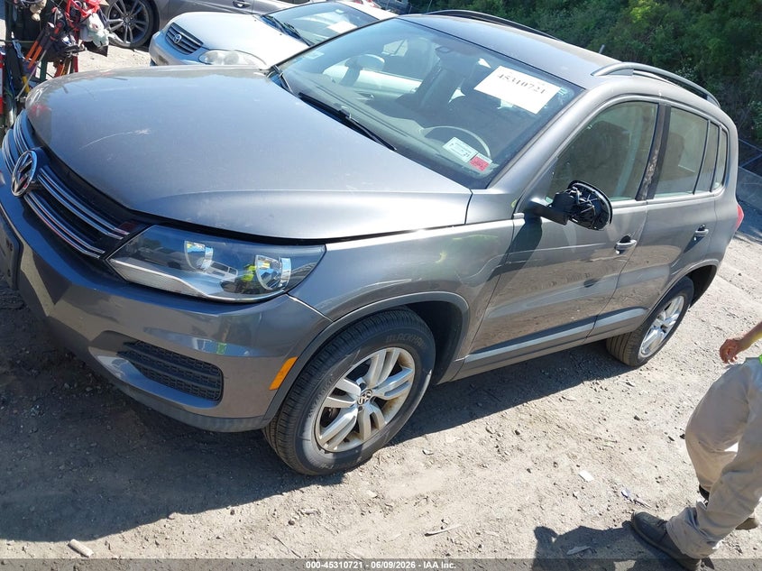 2016 Volkswagen Tiguan VIN WVGBV7AX5GW599673 IAAI salvage auction — NORMAL WEAR, Salvage Title, sold $800 on 2026-07-07 (photo 2)