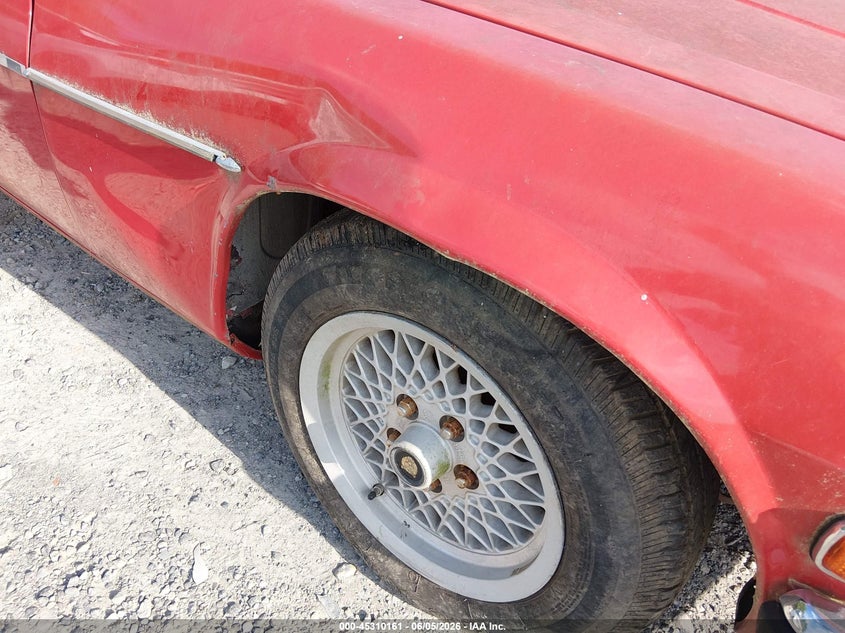 1986 Jaguar Xj series VIN SAJNV584XGC133077 IAAI salvage auction — NORMAL WEAR, Original (Ohio), sold $275 on 2026-07-14 (photo 6)
