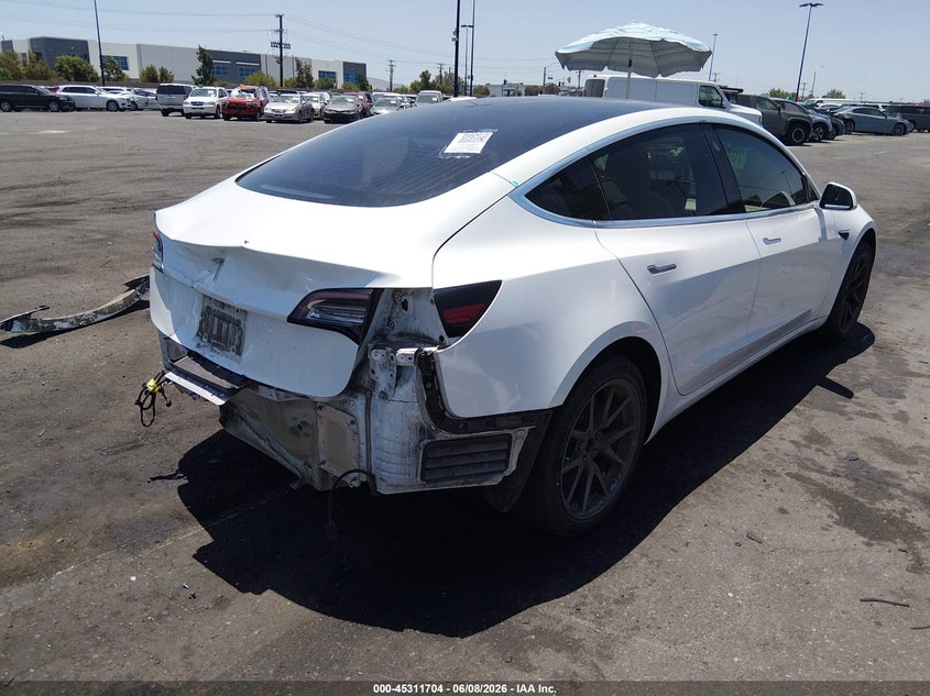 2018 Tesla Model 3 VIN 5YJ3E1EA6JF168556 IAAI salvage auction — REAR END, Salvage Title, sold $3,250 on 2026-07-23 (photo 4)