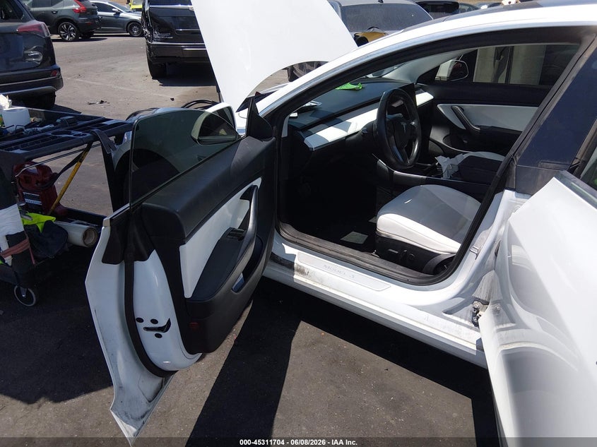 2018 Tesla Model 3 VIN 5YJ3E1EA6JF168556 IAAI salvage auction — REAR END, Salvage Title, sold $3,250 on 2026-07-23 (photo 8)