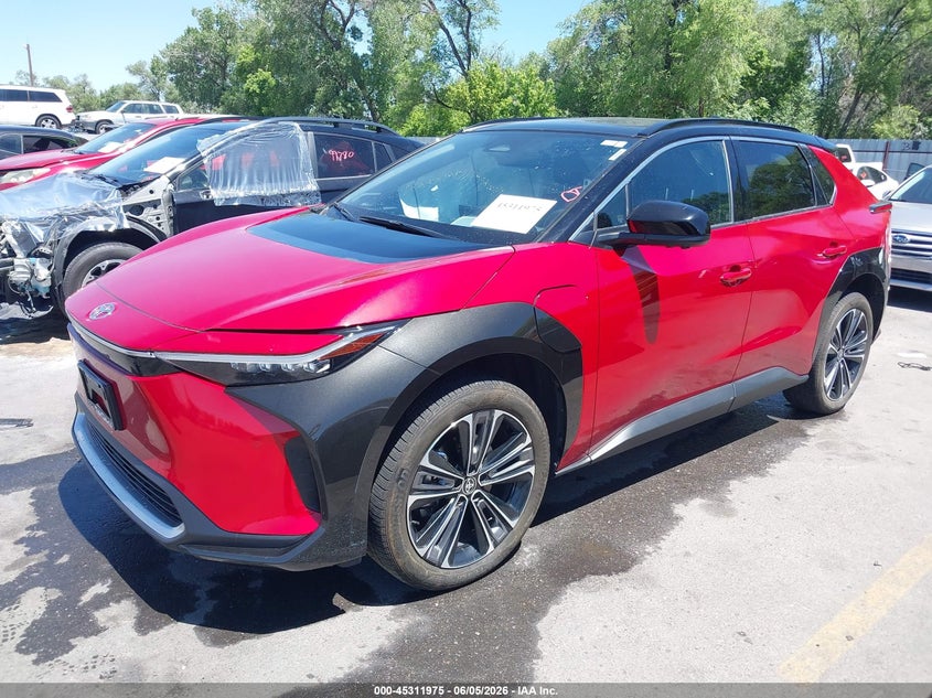 2023 Toyota Bz4x VIN JTMABACA6PA013512 IAAI salvage auction — RIGHT SIDE, Salvage Title, sold $9,975 on 2026-07-09 (photo 2)