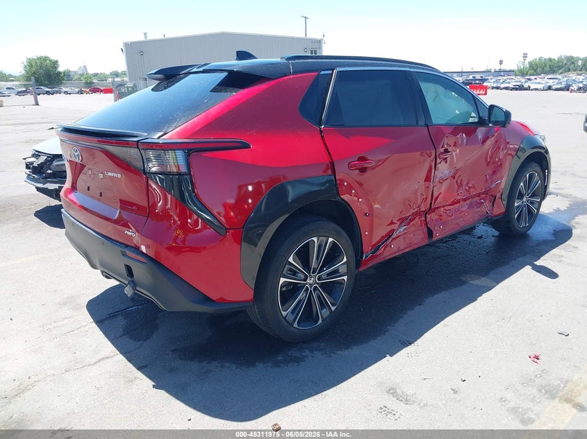 2023 Toyota Bz4x VIN JTMABACA6PA013512 IAAI salvage auction — RIGHT SIDE, Salvage Title, sold $9,975 on 2026-07-09 (photo 4)