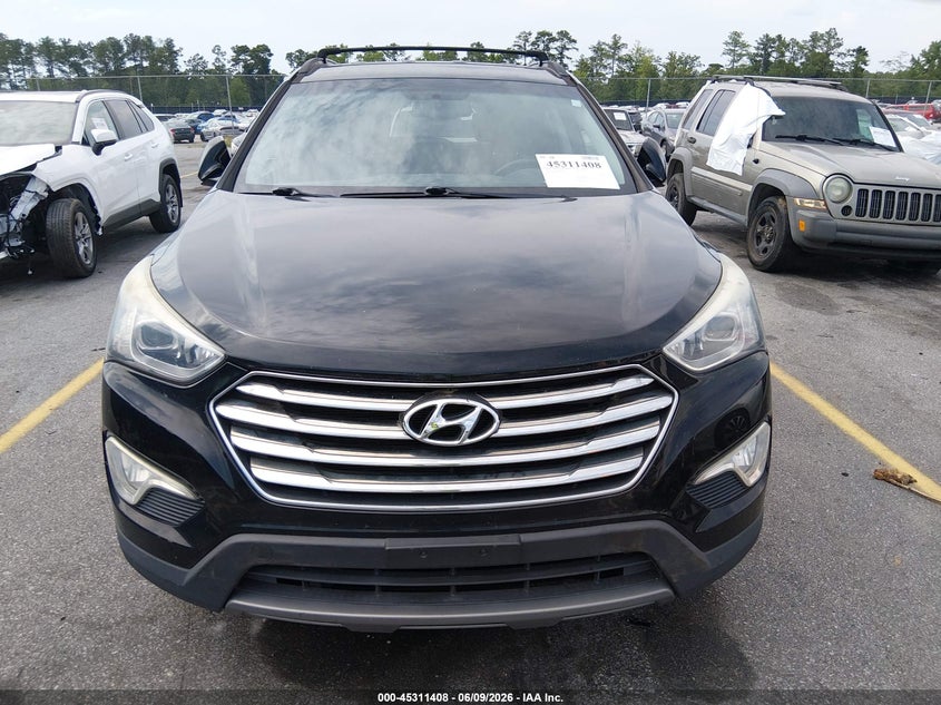 2014 Hyundai Santa fe VIN KM8SM4HF1EU043013 IAAI salvage auction — NORMAL WEAR, Salvage Title, sold $1,600 on 2026-07-15 (photo 6)