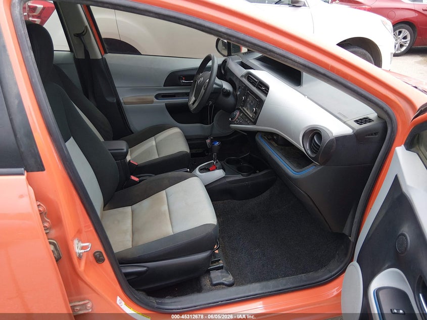 2012 Toyota Prius c VIN JTDKDTB33C1010736 IAAI salvage auction — NORMAL WEAR, Original (Texas), sold $800 on 2026-07-13 (photo 5)