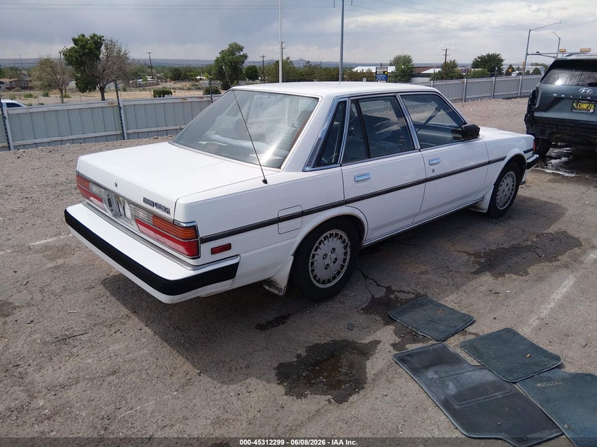 1986 Toyota Cressida VIN JT2MX73E6G0069520 IAAI salvage auction — NORMAL WEAR, Salvage (New Mexico), sold $2,950 on 2026-07-20 (photo 4)