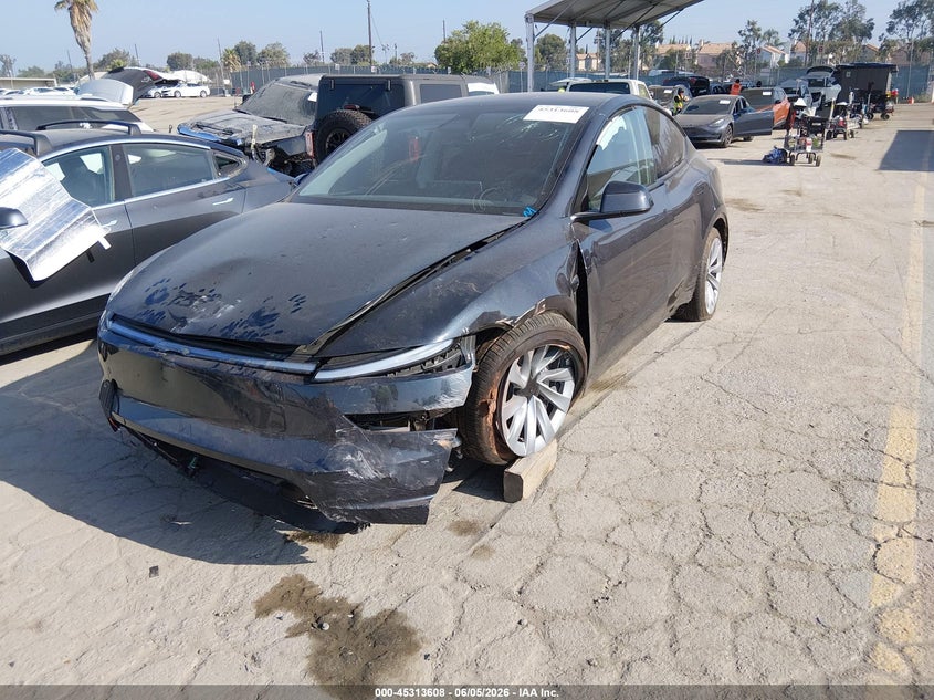 2026 Tesla Model y VIN 7SAYGDEDXTF541597 IAAI salvage auction — LEFT FRONT, Salvage Title, sold $25 on 2026-07-29 (photo 2)