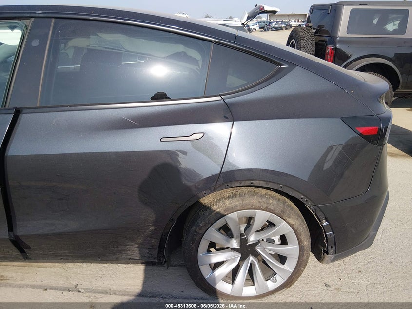 2026 Tesla Model y VIN 7SAYGDEDXTF541597 IAAI salvage auction — LEFT FRONT, Salvage Title, sold $25 on 2026-07-29 (photo 6)