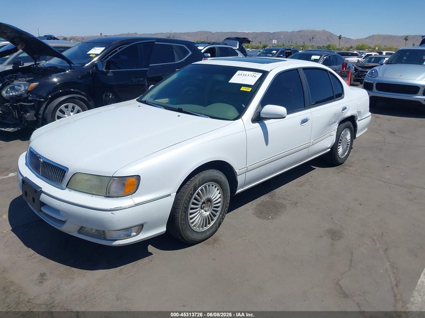 1997 Infiniti I30 VIN JNKCA21D7VT402271 IAAI salvage auction — SIDE, Salvage (Arizona), sold $25 on 2026-07-28 (photo 2)