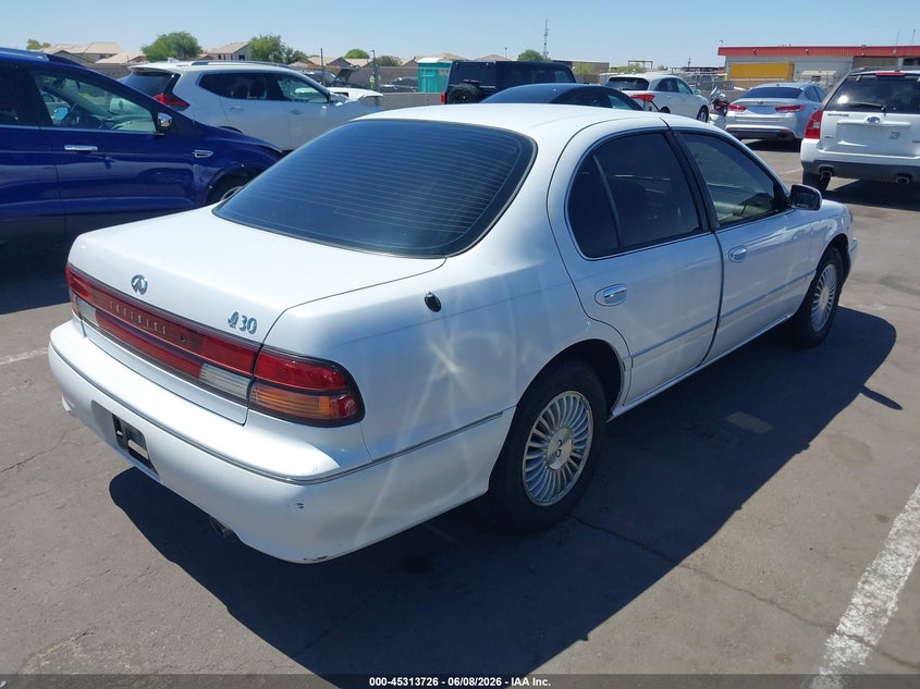 1997 Infiniti I30 VIN JNKCA21D7VT402271 IAAI salvage auction — SIDE, Salvage (Arizona), sold $25 on 2026-07-28 (photo 4)