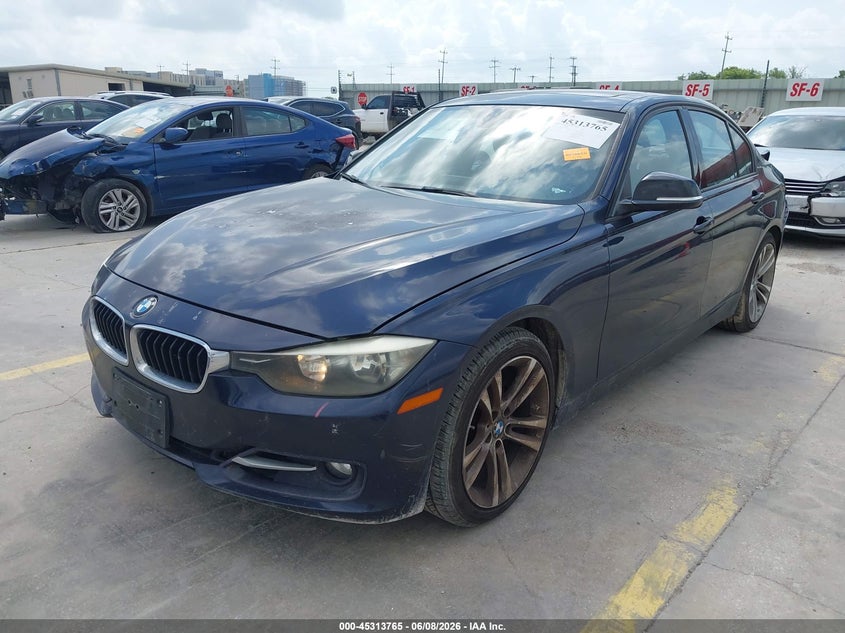 2012 BMW 3er VIN WBA3A5C53CF349571 IAAI salvage auction — REAR END, Salvage Title, sold $1,825 on 2026-07-06 (photo 2)