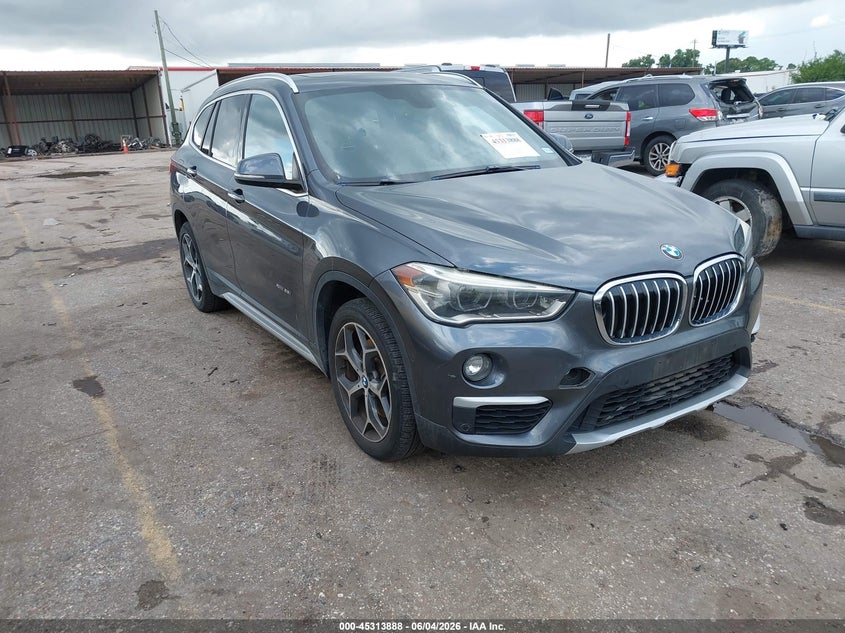 2016 BMW X1 VIN WBXHT3C33GP881962 IAAI salvage auction — WATER/FLOOD, Salvage Title, sold $3,000 on 2026-07-22 (photo 1)