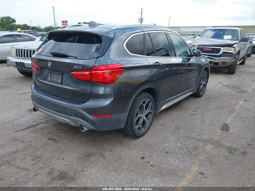 2016 BMW X1 VIN WBXHT3C33GP881962 IAAI salvage auction — WATER/FLOOD, Salvage Title, sold $550 on 2026-07-22 (photo 4)