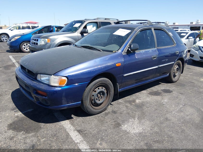 2000 Subaru Impreza VIN JF1GF4359YH800505 IAAI salvage auction — NORMAL WEAR, Regular (Nevada), sold $25 on 2026-07-17 (photo 2)