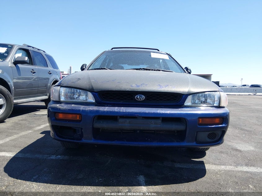 2000 Subaru Impreza VIN JF1GF4359YH800505 IAAI salvage auction — NORMAL WEAR, Regular (Nevada), sold $25 on 2026-07-17 (photo 6)