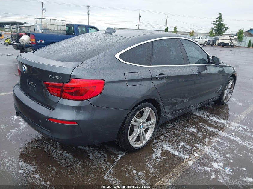 2018 BMW 3er VIN WBA8Z9C57JG828346 IAAI salvage auction — LEFT FRONT, Salvage Title, sold $950 on 2026-07-28 (photo 4)