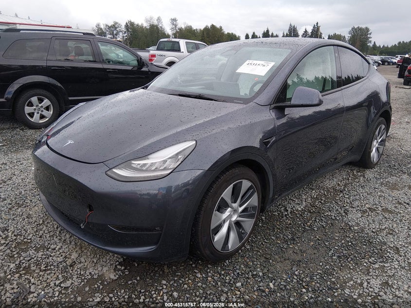 2023 Tesla Model y VIN 7SAYGDEE0PF604009 IAAI salvage auction — FRONT END, Salvage Title, sold $14,850 on 2026-07-08 (photo 2)