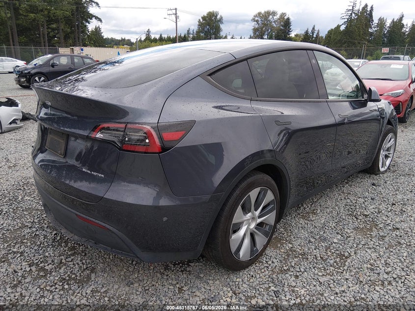 2023 Tesla Model y VIN 7SAYGDEE0PF604009 IAAI salvage auction — FRONT END, Salvage Title, sold $14,850 on 2026-07-08 (photo 4)