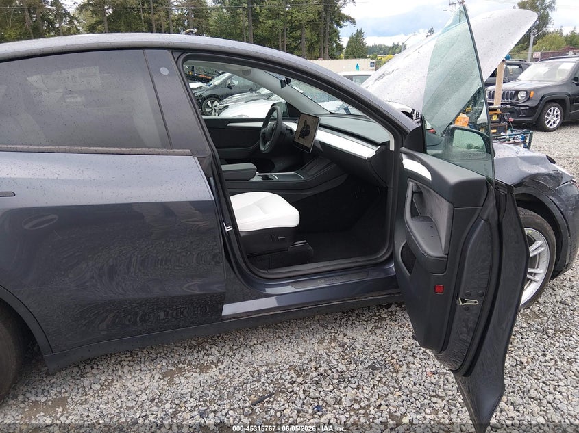 2023 Tesla Model y VIN 7SAYGDEE0PF604009 IAAI salvage auction — FRONT END, Salvage Title, sold $14,850 on 2026-07-08 (photo 5)