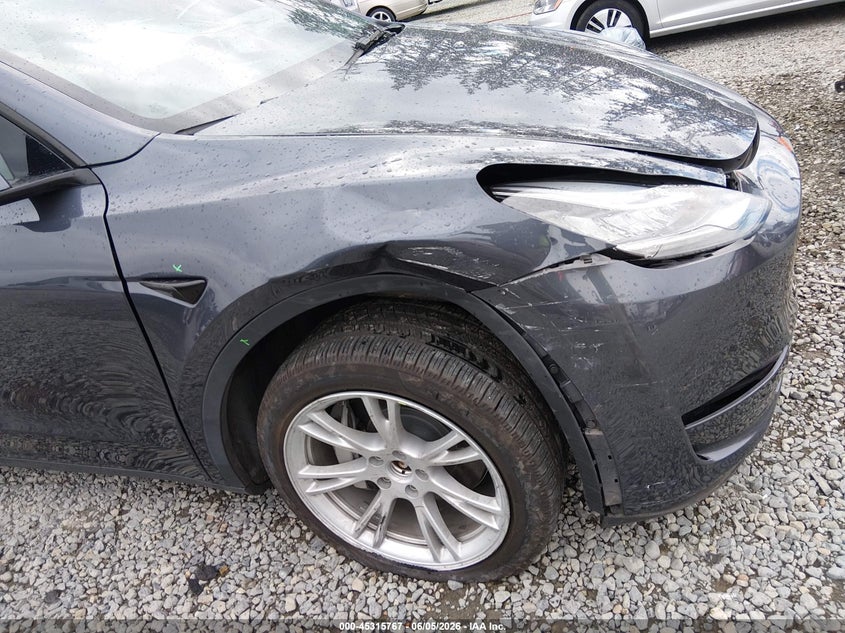 2023 Tesla Model y VIN 7SAYGDEE0PF604009 IAAI salvage auction — FRONT END, Salvage Title, sold $14,850 on 2026-07-08 (photo 6)