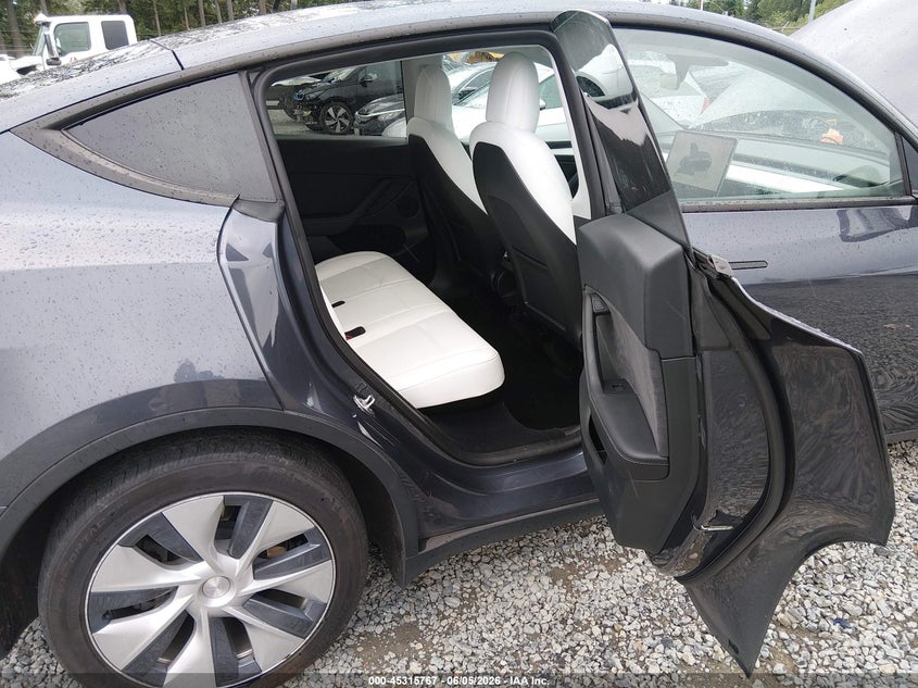 2023 Tesla Model y VIN 7SAYGDEE0PF604009 IAAI salvage auction — FRONT END, Salvage Title, sold $14,850 on 2026-07-08 (photo 8)
