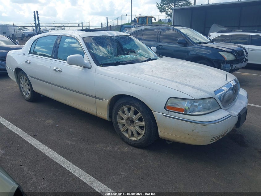 2007 Lincoln TOWN CAR VIN 1LNHM82V27Y628972 IAAI salvage auction — ROOF, Salvage (Mississippi), sold $1,000 on 2026-07-09 (photo 1)