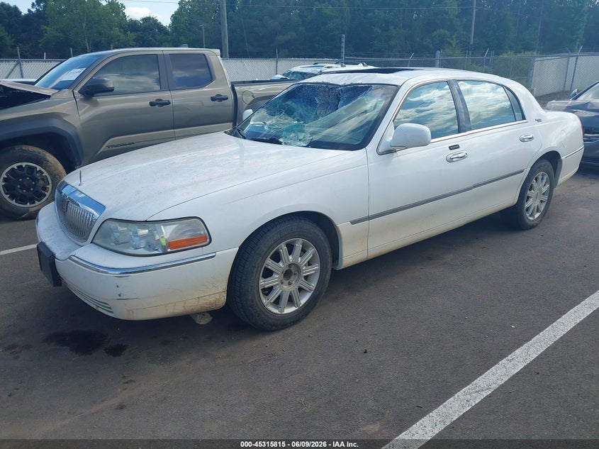 2007 Lincoln TOWN CAR VIN 1LNHM82V27Y628972 IAAI salvage auction — ROOF, Salvage (Mississippi), sold $1,000 on 2026-07-09 (photo 2)