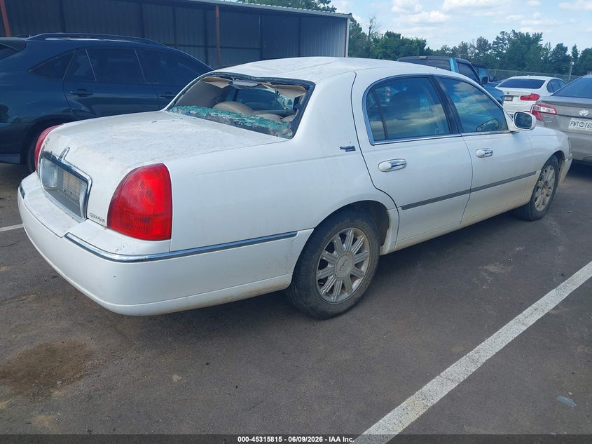 2007 Lincoln TOWN CAR VIN 1LNHM82V27Y628972 IAAI salvage auction — ROOF, Salvage (Mississippi), sold $1,000 on 2026-07-09 (photo 4)