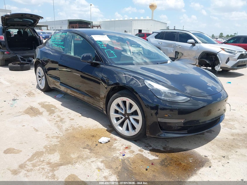 2023 Tesla Model 3 VIN 5YJ3E1EA1PF596592 IAAI salvage auction — REAR END, Original (Texas), sold $10,000 on 2026-09-06 (photo 1)