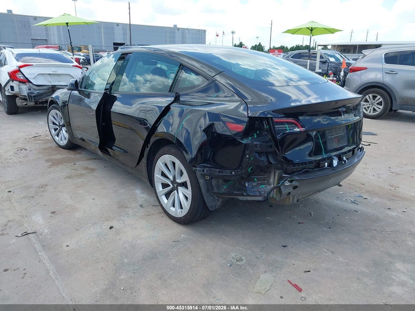 2023 Tesla Model 3 VIN 5YJ3E1EA1PF596592 IAAI salvage auction — REAR END, Original (Texas), sold $10,000 on 2026-09-06 (photo 3)