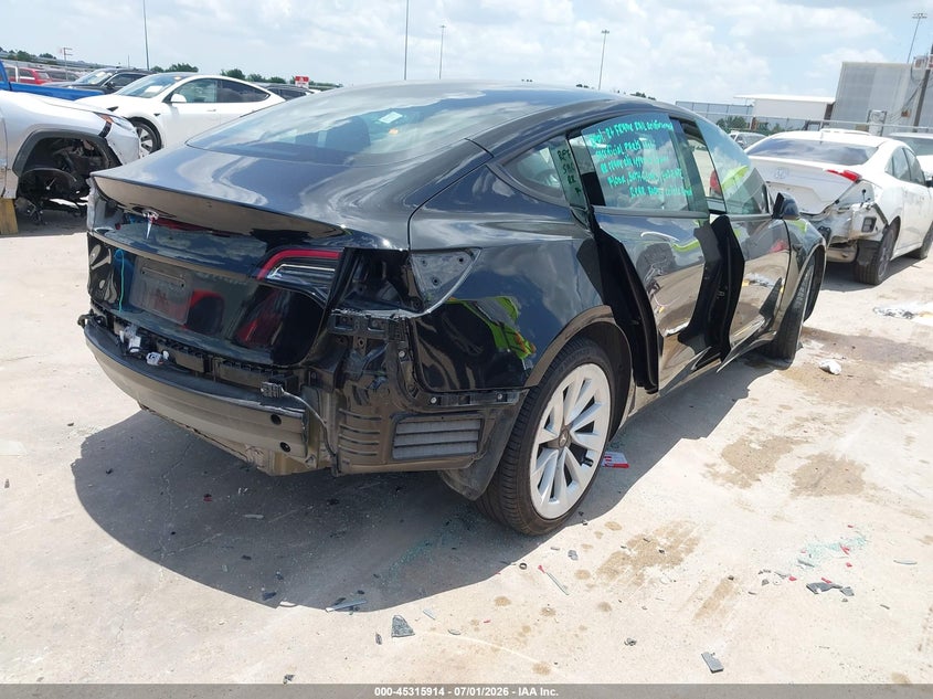 2023 Tesla Model 3 VIN 5YJ3E1EA1PF596592 IAAI salvage auction — REAR END, Original (Texas), sold $10,000 on 2026-09-06 (photo 4)