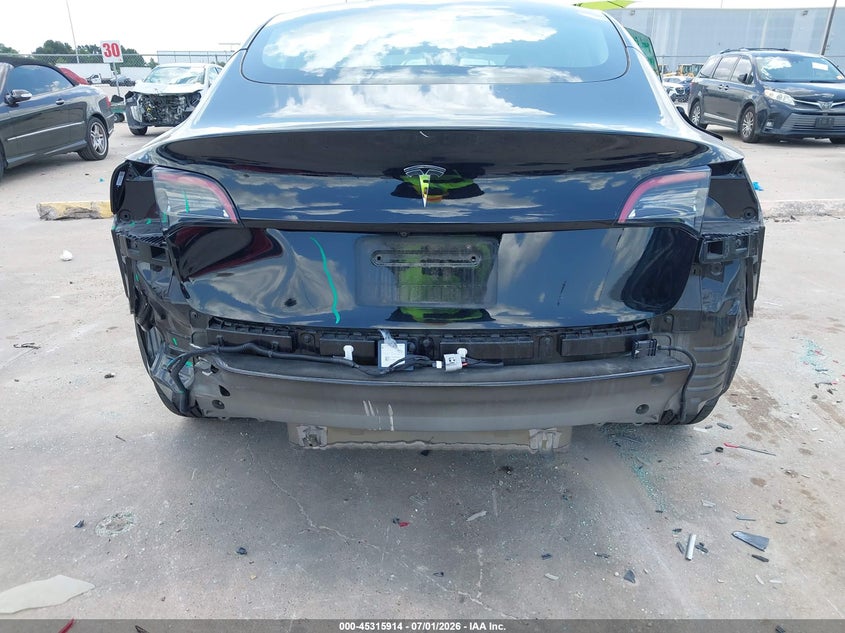2023 Tesla Model 3 VIN 5YJ3E1EA1PF596592 IAAI salvage auction — REAR END, Original (Texas), sold $10,000 on 2026-09-06 (photo 6)