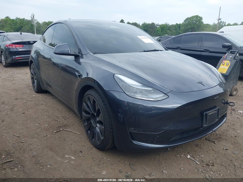 2025 Tesla Model y VIN 7SAYGDEFXSA338075 IAAI salvage auction — LEFT FRONT, Salvage Title, sold $16,600 on 2026-07-30 (photo 1)