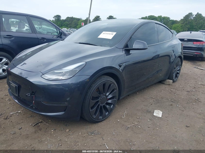 2025 Tesla Model y VIN 7SAYGDEFXSA338075 IAAI salvage auction — LEFT FRONT, Salvage Title, sold $16,600 on 2026-07-30 (photo 2)