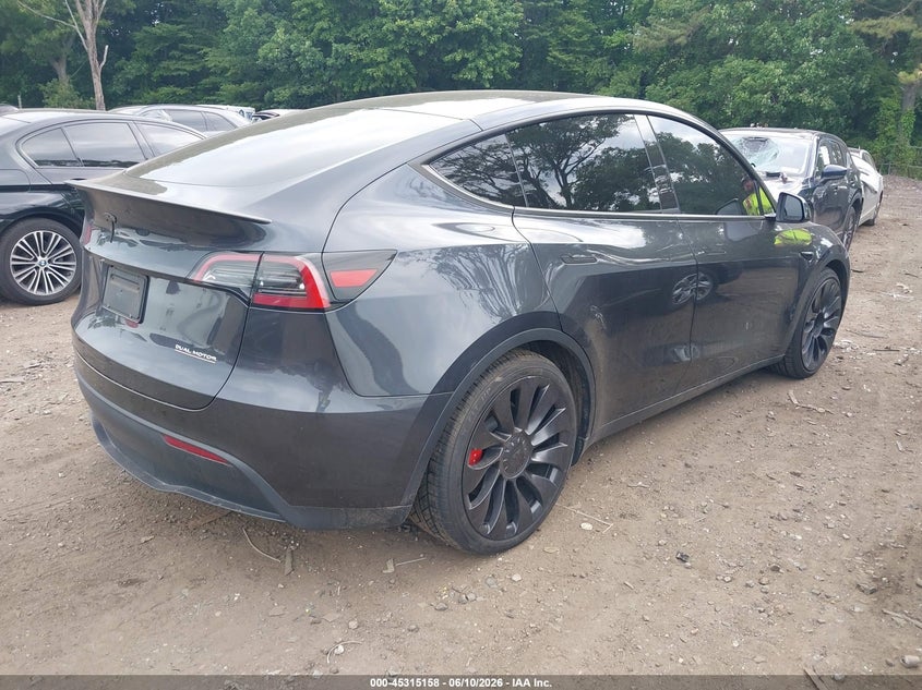 2025 Tesla Model y VIN 7SAYGDEFXSA338075 IAAI salvage auction — LEFT FRONT, Salvage Title, sold $16,600 on 2026-07-30 (photo 4)