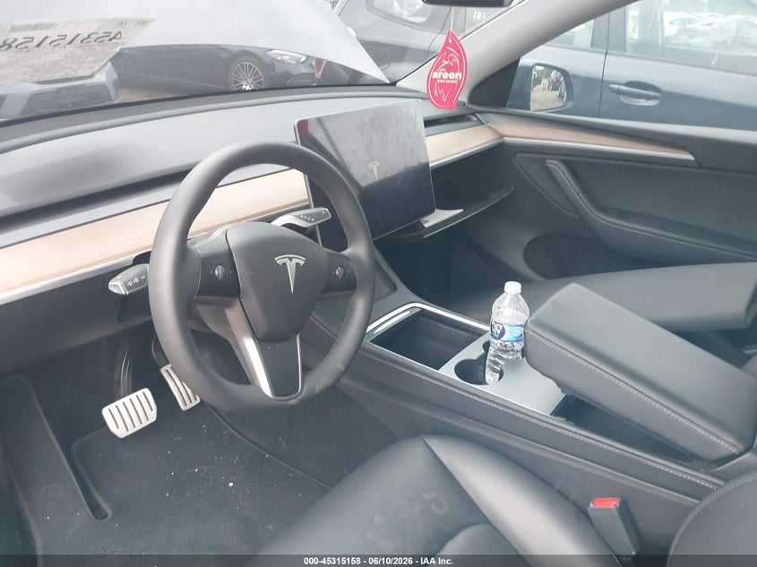 2025 Tesla Model y VIN 7SAYGDEFXSA338075 IAAI salvage auction — LEFT FRONT, Salvage Title, sold $16,600 on 2026-07-30 (photo 5)