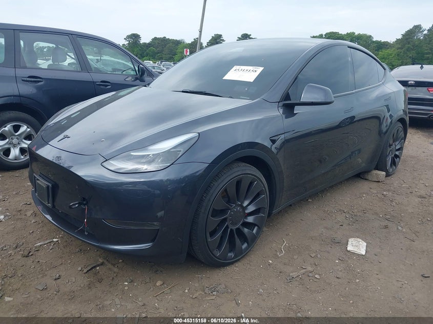 2025 Tesla Model y VIN 7SAYGDEFXSA338075 IAAI salvage auction — LEFT FRONT, Salvage Title, sold $16,600 on 2026-07-30 (photo 6)