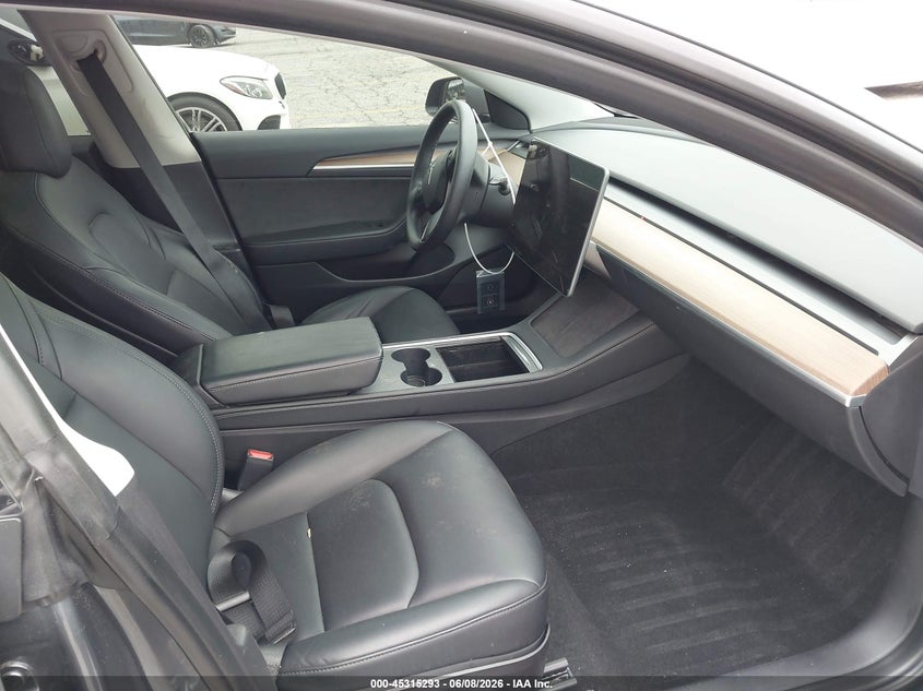 2023 Tesla Model 3 VIN 5YJ3E1EAXPF409754 IAAI salvage auction — FRONT & REAR, Salvage Title, sold $7,700 on 2026-07-07 (photo 5)