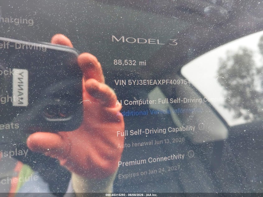 2023 Tesla Model 3 VIN 5YJ3E1EAXPF409754 IAAI salvage auction — FRONT & REAR, Salvage Title, sold $7,700 on 2026-07-07 (photo 7)