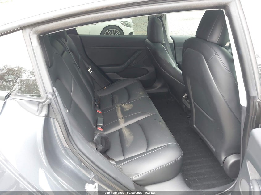 2023 Tesla Model 3 VIN 5YJ3E1EAXPF409754 IAAI salvage auction — FRONT & REAR, Salvage Title, sold $7,700 on 2026-07-07 (photo 8)